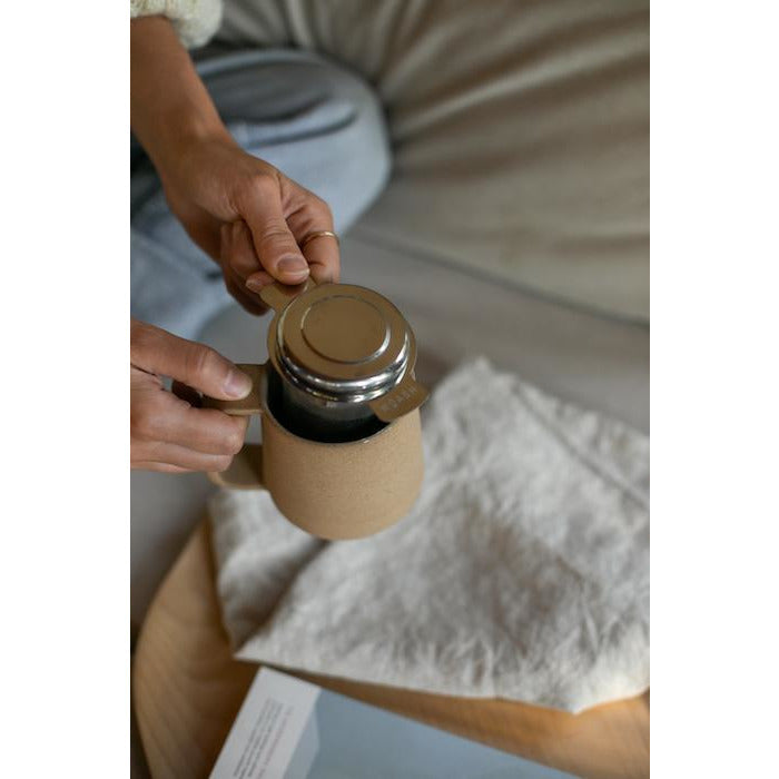 stainless steel tea infuser and ceramic mug